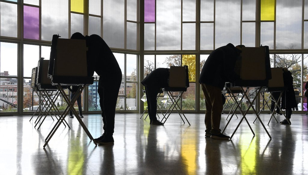 Voters mark their ballots at First Presbyterian Church on Election Day, Tuesday, Nov. 3, 2020, in Stamford, Conn. (AP)